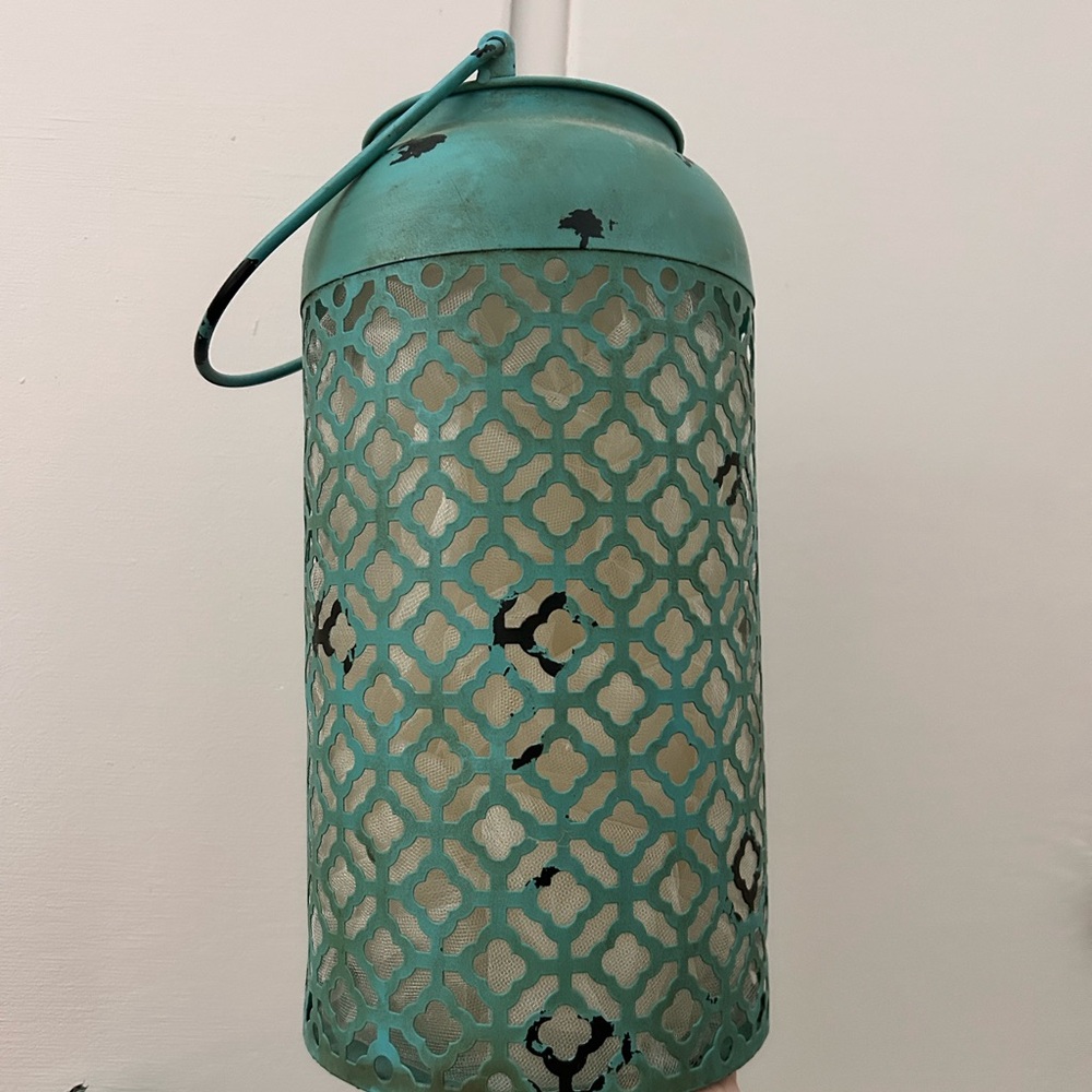 Teal Metal Lantern with Intricate Cutout Design